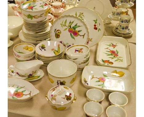 A Royal Worcester Evesham dinner service, including dinner, side, salad plates, soup bowls, tureen, Ramekins, etc.