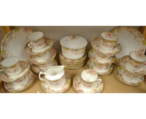A Royal Albert tea service, Clematis, comprising plates, sugar and cream, teacups, saucers, etc. 