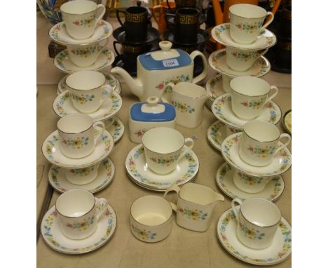 A Royal Doulton tea service, Pastorale H. 5002, comprising tea plates, tea plates, teacups and saucers, coffee cans, teapot, 