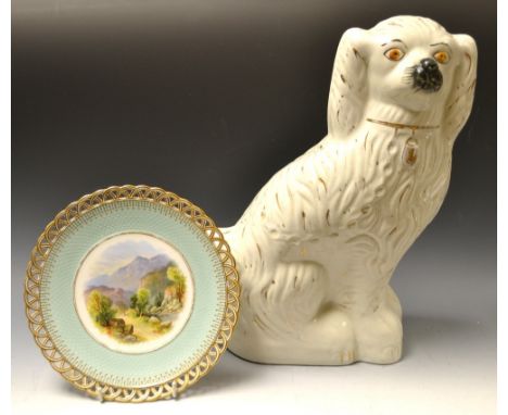 A large Victorian Staffordshire mantel dog; a cabinet plate, pierced border, the central cartouche painted with a mountain la