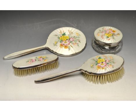 An enamel dressing table set, comprising powder bowl; brushes and hand mirror