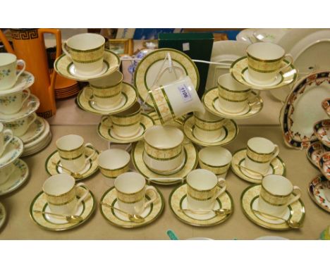 An Elizabethan Cavendish pattern tea and coffee service for six, with Apostle spoons en suite, comprising teacups and saucers