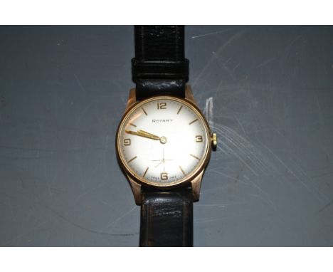 A gentleman's 9ct gold case Rotary wristwatch, silvered dial, 
Arabic numerals and baton markers, subsidiary seconds, black l