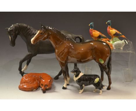 Beswick- a model racehorse, brown gloss; a black beauty, matt; a pair of pheasants; a collie dog; a fox; two Wade Whimseys (8