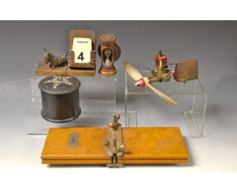 Boxes and Objects - a Fostrian tie press; a wooden egg timer; a model aeroplane engine and fuel tank; a carved German treen c