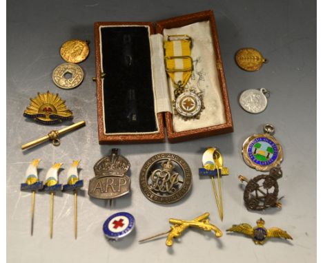 An enamel on silver badge; other badges ARP commemorative; etc