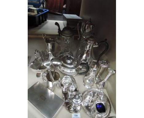 A selection of silver plated items including claret jug, lidded glass tankard, sugar caster, ladle,cigarette box etc