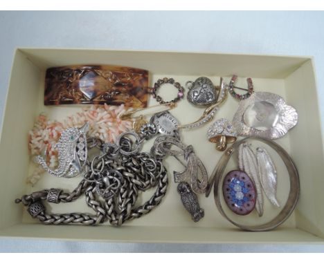 A small selection of costume jewellery including Miglio necklace, white metal bangle and leaf pendants, coral necklace, Frenc