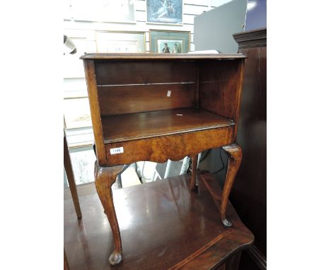 An early 20th century walnut side/bed table stamped Gill & Reigate, having rectangular tray top over recess and drawer on cab