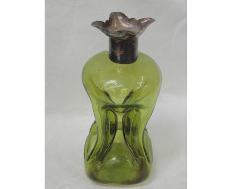 A green glass glugg decanter having a silver quadrafoil spout rim, Sheffield 1892, Henry Atkin, missing stopper