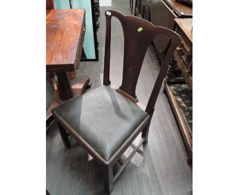 A late 18th century mahogany vernacular chair having vase splat, with later drop in seat and square legs