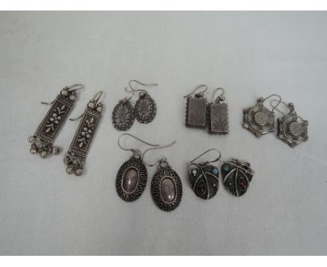Six pairs of HM silver and white metal earrings including early 20th century and leaf design with opal and garnet cabouchon s