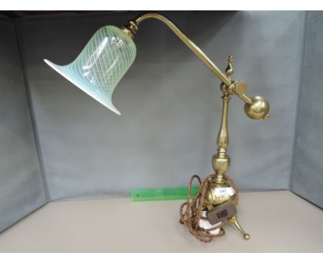 A vintage brass refurbished adjustable student lamp having baluster and ball support on tripod base, with vaseline glass shad