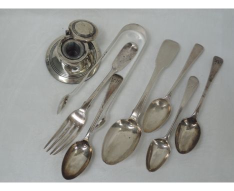 A selection of HM silver including capstan inkwell, Victorian fork and Georgian flatware including sugar nips and Irish spoon