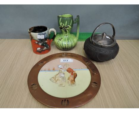 A Dutch ceramic pot stand having copper rim, a Wedgwood black basalt lidded pot, a pottery mug glazed with figure decoration 