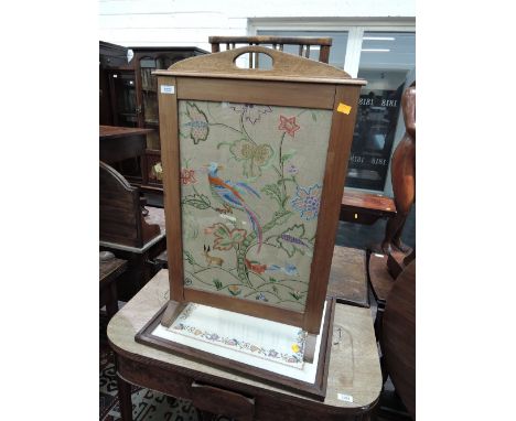 A mid 20th century mahogany frame firescreen having needlework panel inset and an oak frame tray having needlework panel inse
