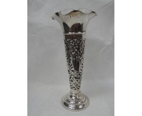 A large silver trumpet vase having pierced decoration, frilled rim and weighted base, Sheffield 1912  Walker & Hall (with mat