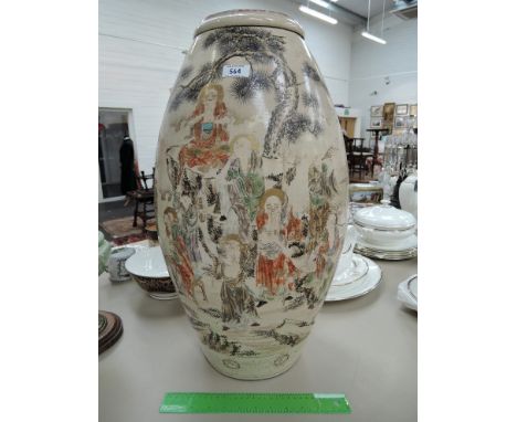 An early 20th century Satsuma pottery vase of large barrel design having pictorial immortal decoration