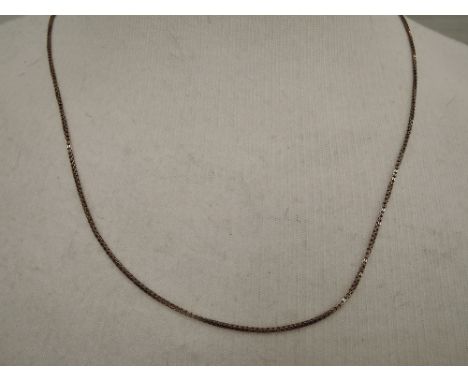 A yellow metal chain stamped 9ct,  approx 5.6g & 22' long