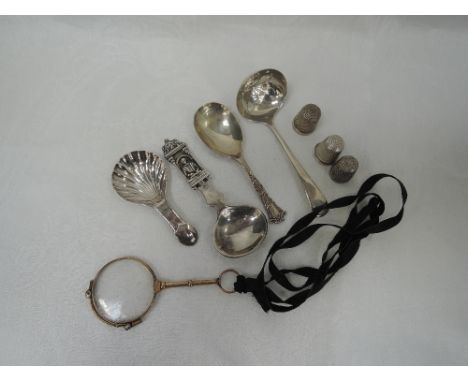 A selection of HM silver including thimbles, caddy spoons and sugar sifting spoon, and a rolled gold lorgnette