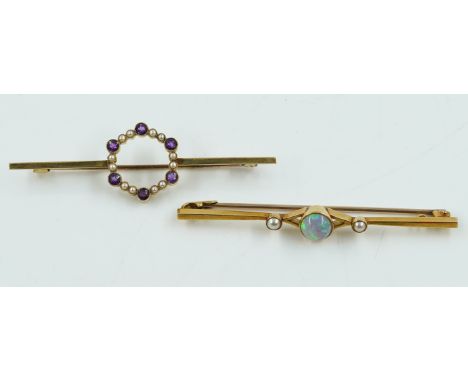 TWO EDWARDIAN BAR BROOCHES (2)One set with an opal and two half pearls, the other in a circular design of amethysts and seed 