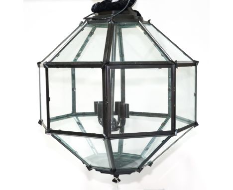A PAIR OF BLACK METAL OCTAGONAL FACETED HANGING LIGHTS (2)Recent Manufacture 
Each with a four light suspension, 66cm wide ap