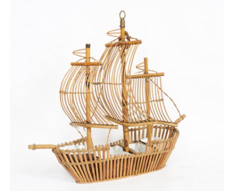 A BAMBOO AND CANE HANGING LIGHT MODELLED AS A SHIPModern
With three masts and caned sails, four light fittings in the hull, 1