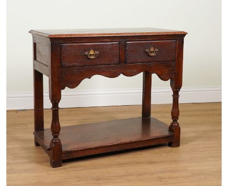 TITCHMARSH & GOODWIN; AN OAK TWO DRAWER SIDE TABLE91cm wide; 45cm deep; 77cm highSome light surface wear to the polish of the