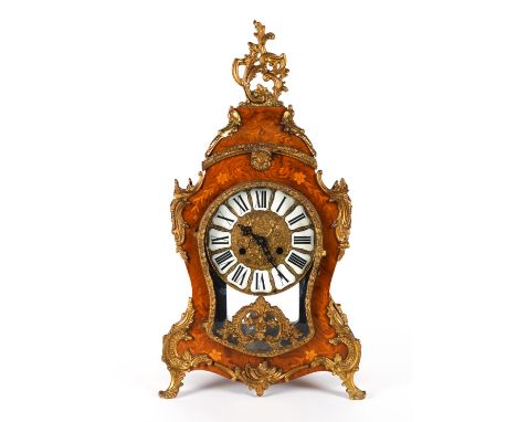 A LOUIS XIV STYLE GILT-METAL MARQUETRY MANTEL CLOCK20th Century 
With shaped case and dome top mounted with scrolling acanthu