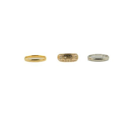 A GOLD AND DIAMOND RING AND TWO WEDDING RINGS (3)The first star set with a row of four rose cut diamonds, detailed indistinct