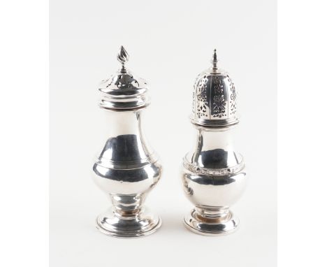 TWO SILVER SUGAR CASTERS (2)The first decorated with a Celtic style band, Birmingham 1940, the second of pear shaped form, ha