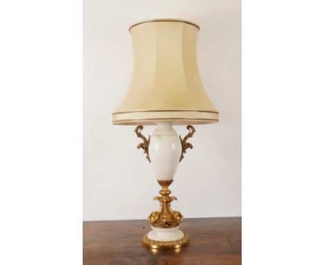 A GILT-METAL MOUNTED WHITE MARBLE BALUSTER TABLE LAMP AND A CHINESE SANG DE BOEUF BALUSTER TABLE LAMP (2)The white marble lam