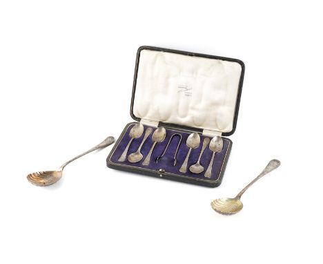 A GROUP OF CASED SILVER FLATWAREComprising; a set of six teaspoons haven a beaten finish, Sheffield 1920, with a matching pai