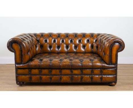 A VICTORIAN STYLE BUTTON-BACK LEATHER UPHOLSTERED CHESTERFIELD SOFA170cm wide; 70cm high