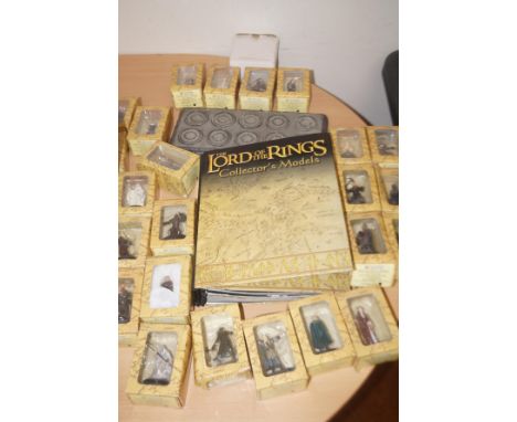 Lord of the rings collectors models, booklets &amp; stand 