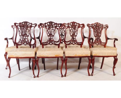 A set of six Edwardian mahogany pierced back dining chairs together with two seater sofa / settee window seat. Having a pierc