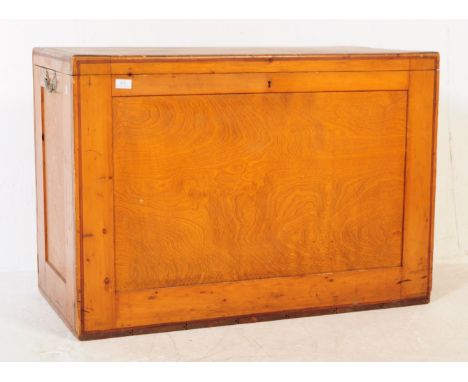 A mid 20th century panel wood storage box / chest trunk. Of rectangular form with one ebonised handle to left. Hinged lid ope
