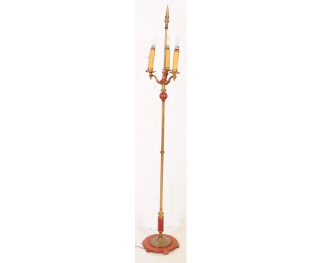 A retro mid 20th century ecclesiastical&nbsp;brass floor standing standard lamp. The lamp having a textured shaft, highlighte