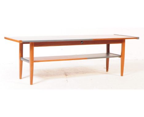 Richard Hornby - Fyne Ladye Furniture - A retro 20th Century teak wood coffee table / low table having rectangular top with a