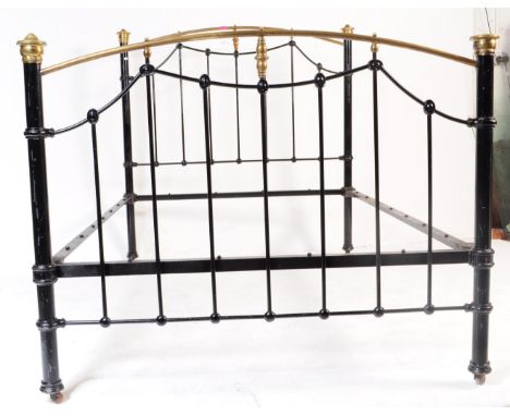 A 19th century Victorian ebonised brass double bedstead bed frame. The bed frame having arched top rail with rails of swag sh