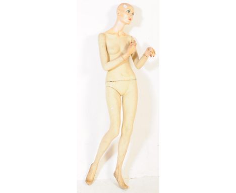 A vintage 20th century advertising haberdashery shop display, female dressmaker dummy model mannequin by Adel Rootenstein . O