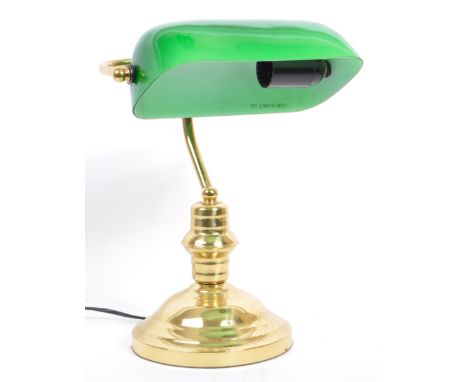 A late 20th century 1920s style gilt metal and green glass bankers table lamp. The lamp having lozenge green shade over hooke