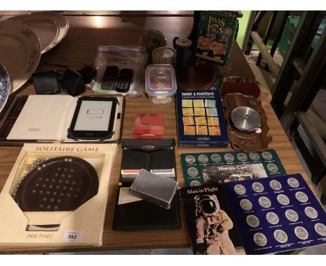 AN ASSORTMENT OF ITEMS TO INCLUDE A KINDLE, MOBILE PHONES, FOUR PACKS OF CARDS, COASTERS, A LARGE BOBBIN OF SILK THREAD ETC 