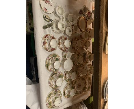 A COLLECTION OF BONE CHINA CUPS, SAUCERS, MILK JUGS, SUGAR BOWLS, PLATES ETC TO INCLUDE TUSCAN, ROYAL ALBERT  ETC 