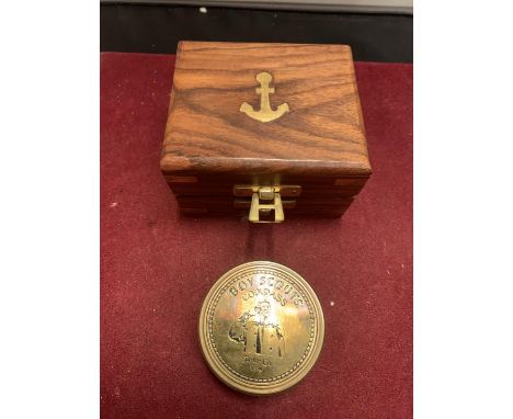 A SMALL BOXED BRASS BOY SCOUT COMPASS 