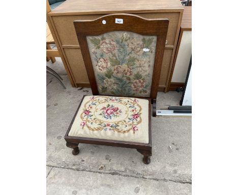 AN OAK FRAMED TAPESTRY FIRESCREEN AND CABRIOLE LEG STOOL 