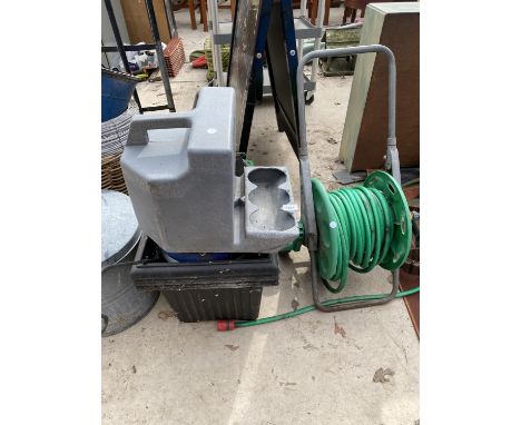AN ASSORTMENT OF ITEMS TO INCLUDE A HOSE PIPE, REELS OF WIRE AND EXTENSION LEADS ETC 