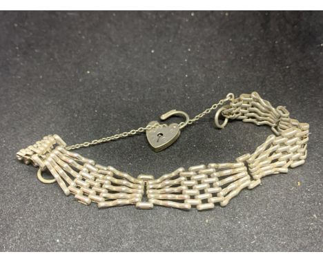 A SILVER GATE BRACELET 