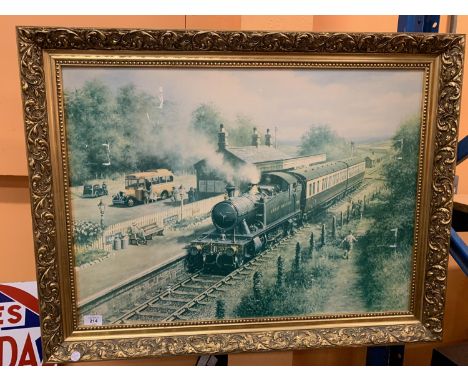 A VERY LARGE GILT FRAMED PRINT ON BOARD DEPICTING A GREAT WESTERN STEAM TRAIN STAMPED SWEDEN ON BACK OF BOARD (A/F)67CM X 87C