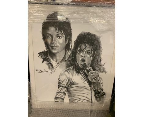 A FRAMED PRINT OF A PORTRAIT OF MICHAEL JACKSON 